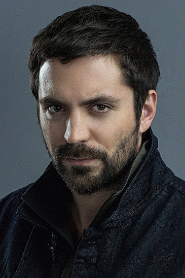 Rhys Coiro as Adam in Paradise City