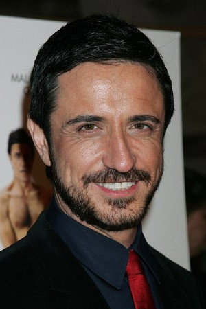 Craig Chester as Mark in Grief