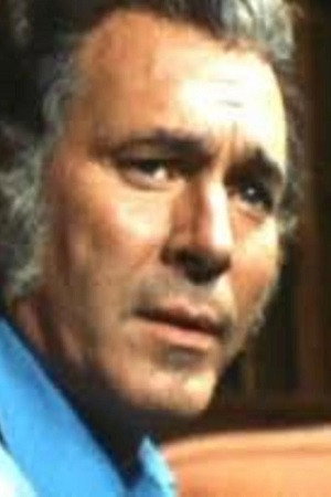 Richard Towers as Dr. John Collingwood in The Last House on the Left