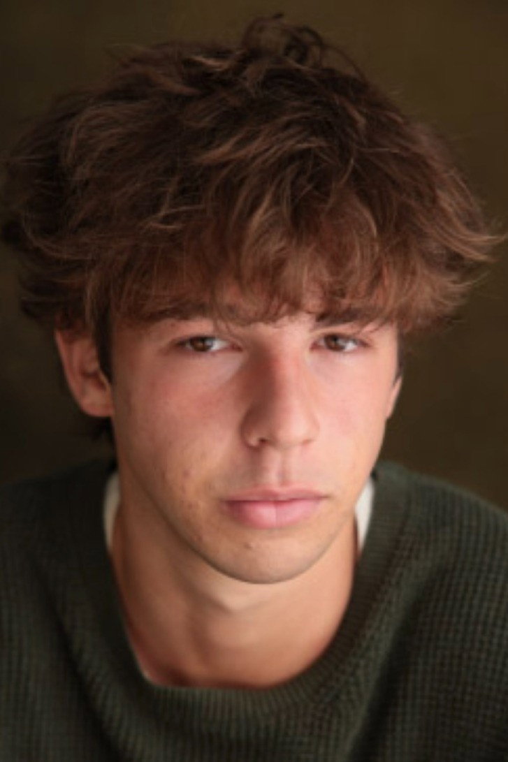 Caleb Nazzer as James in Literally Dead
