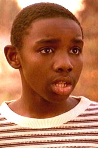 Tony T. Johnson as Chris in Amen