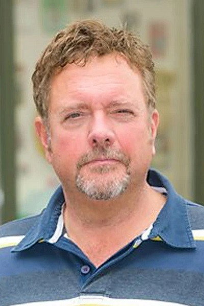 Alun ap Brinley as Sgt. Emlyn Dawkins in The Indian Doctor