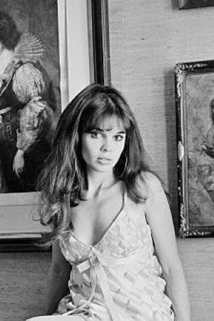 Viviane Ventura as Receptionist in Return from the Ashes
