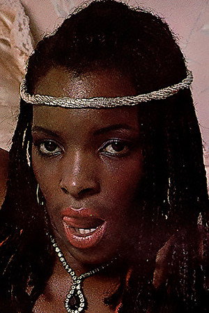 Satin Summer as Native Girl 1 in Romancing the Bone