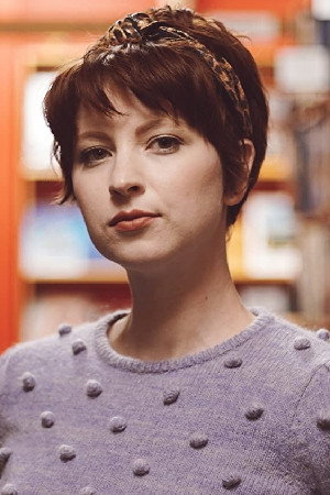 Megan Louise Berndt as Happy Couple Woman in Evie