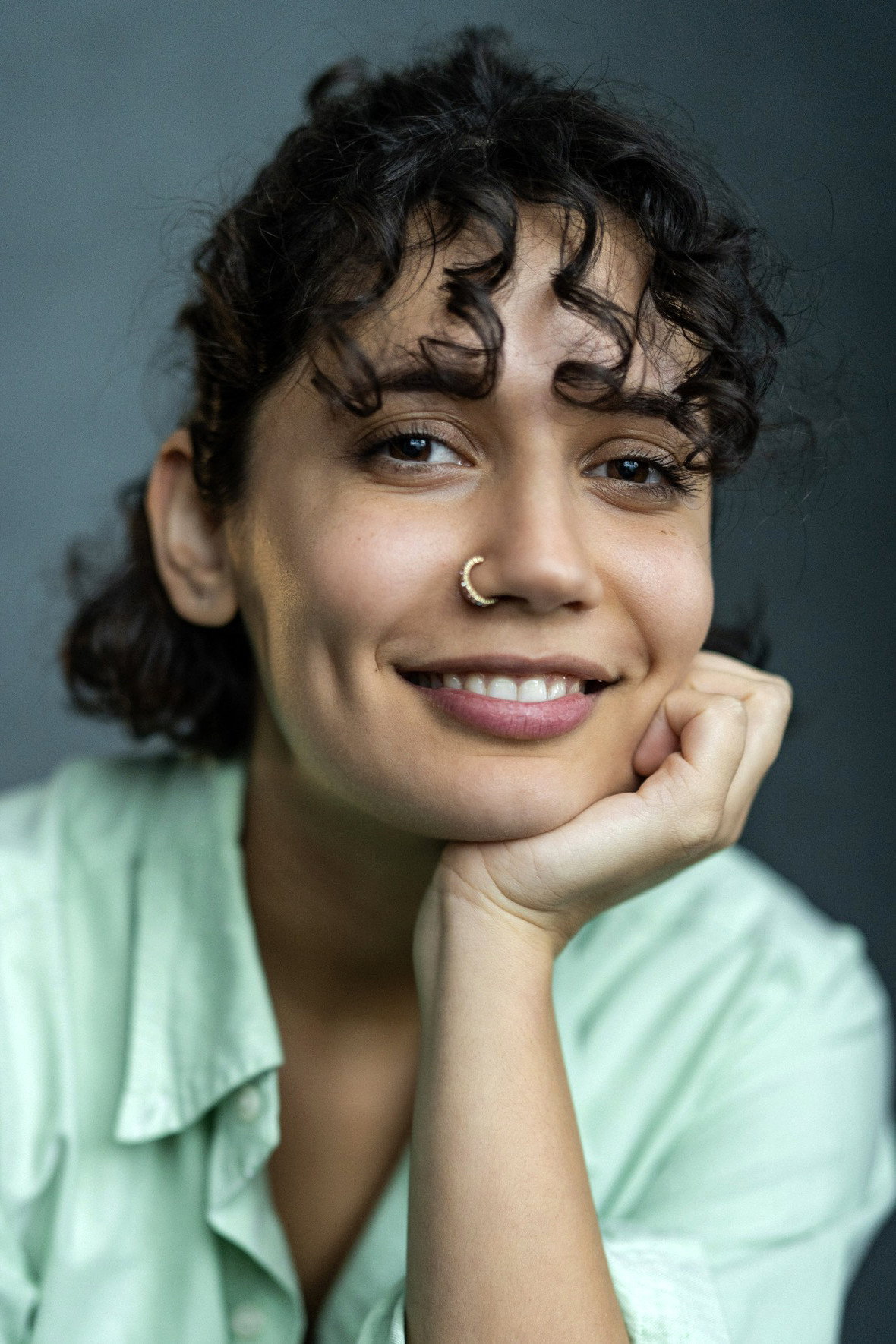 Olivia D'Lima as Mira in There Will Come Soft Rains