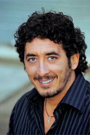 Nando Irene as Andrea in A Year in London