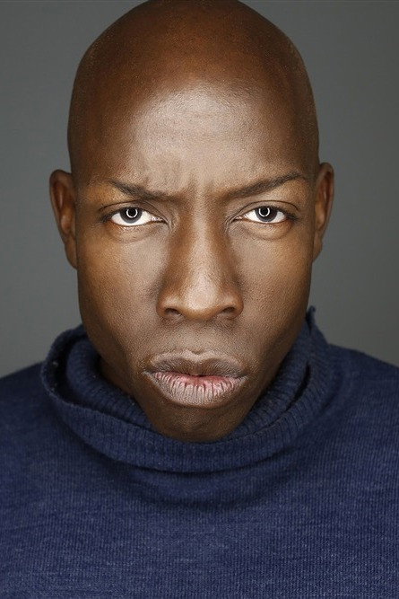 Akil Wingate as Operator in Top Floor