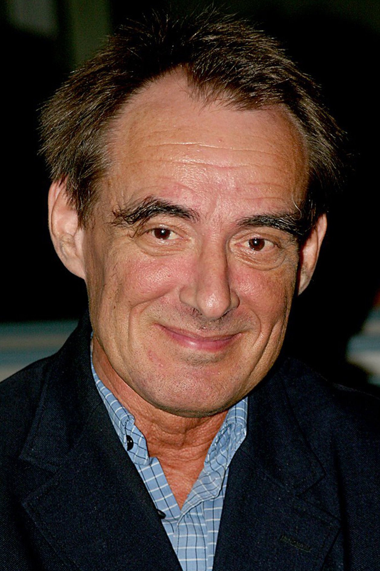 Göran Holm as Teacher (uncredited) in Us