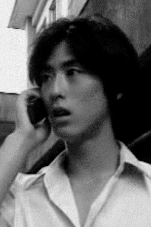 Kazushi Andō as Tsuyoshi Murakami in Ju-on: The Curse