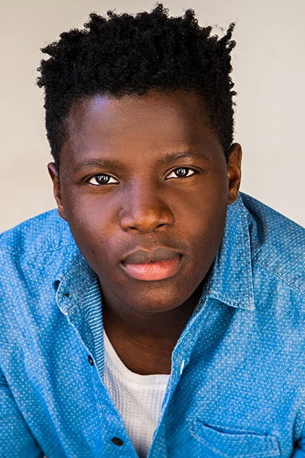 Adrian Walters as Akai in It Comes in Waves