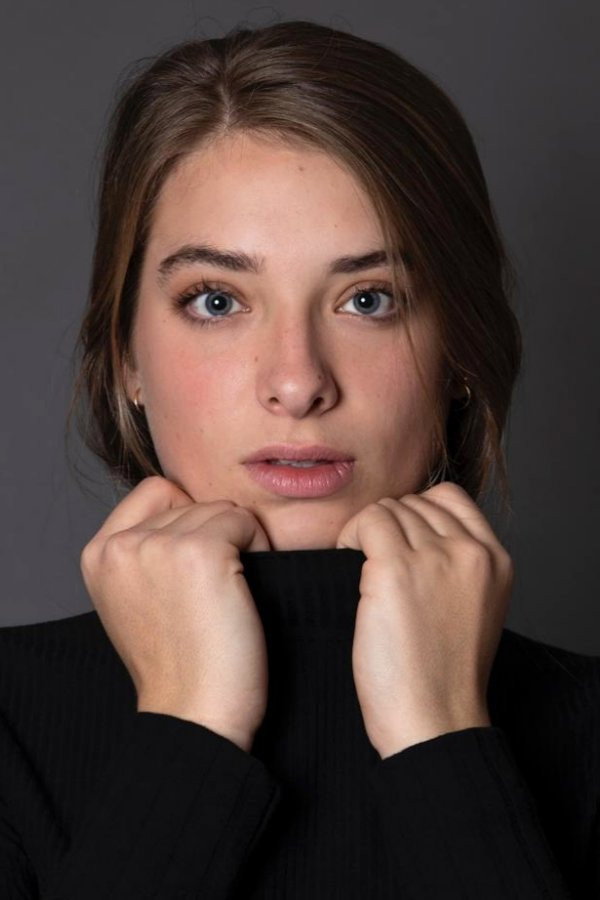 María José de la Cruz as Emily in This Never Happened