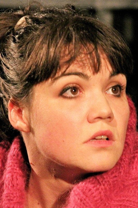 Alexics Rita as Buksi, the prompter in Csak színház és más semmi