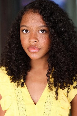 Nadia Simms as Esta Mckenzie in A Christmas Wish