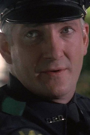 Mark Schooley as Johnnie Skee in They Nest