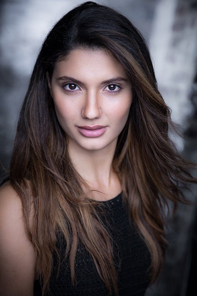 Andrea Vasiliou as Suzanne in Legacy of Lies