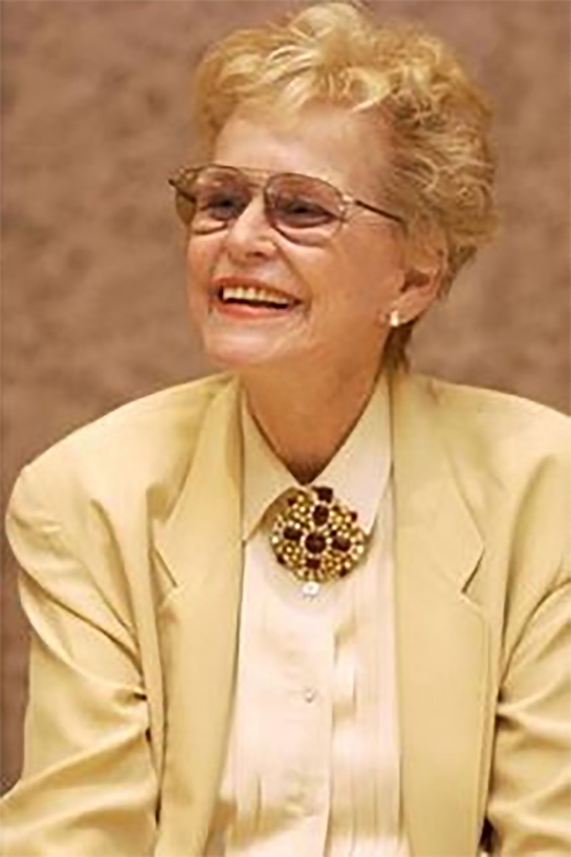 Diana Douglas as Evelyn Gromberg in It Runs in the Family