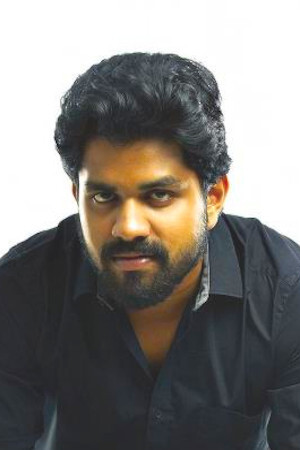 Vineeth Mohan as Kuttan Moonga in Aadu