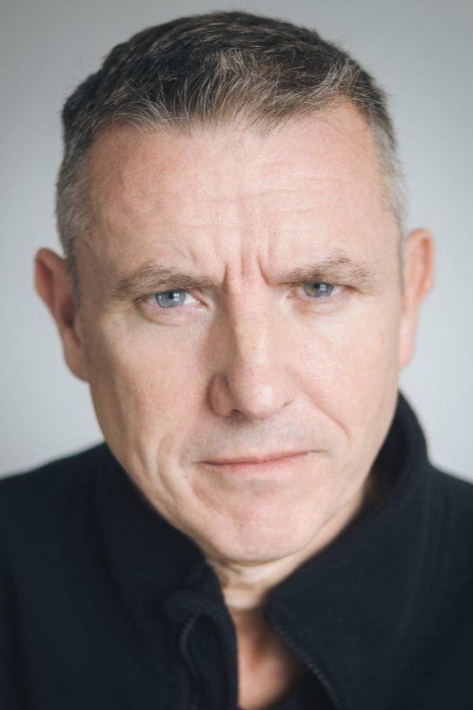 Wayne Liversidge as John / Masked Guard in The Cellar