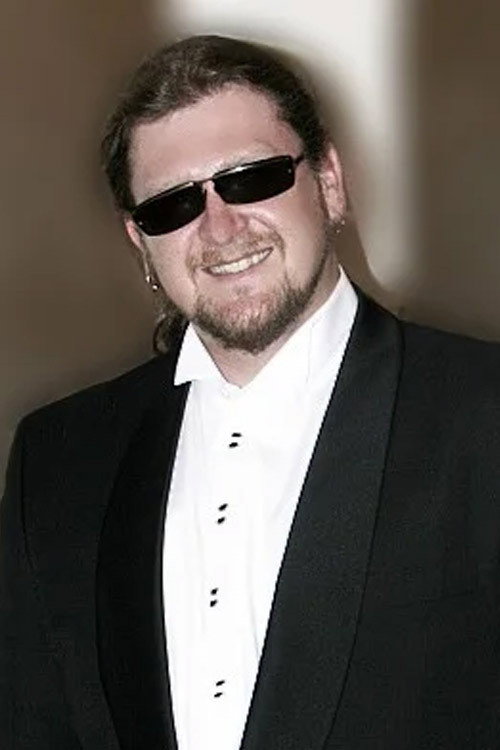 Roman Janečka as George in A Day's Work