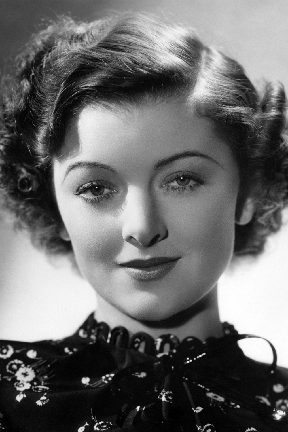 Myrna Loy as Alma Harding in Too Hot to Handle