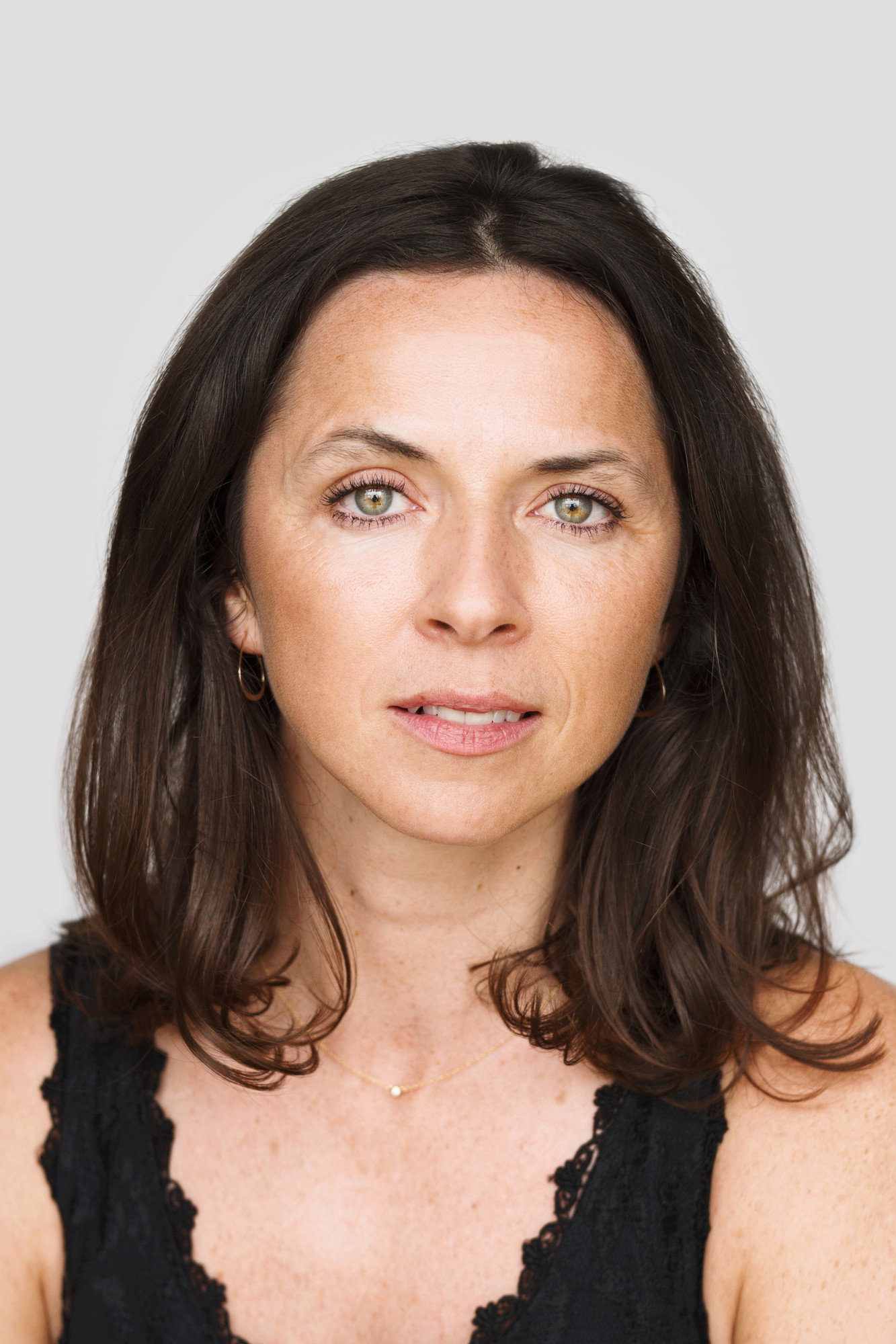 Kathryn McGarr as Maggie Hand in Murder at the Embassy