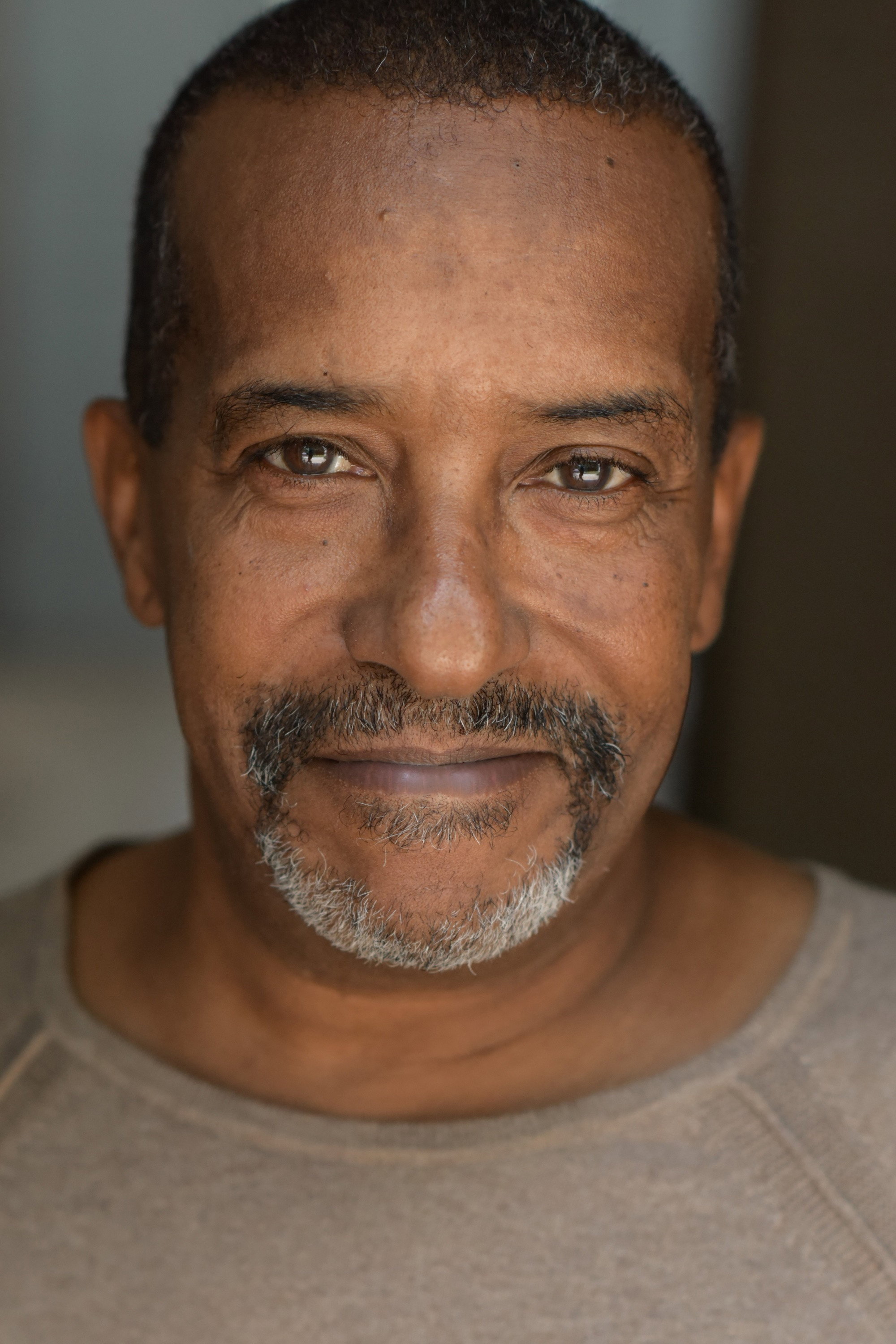 Donn C. Harper as Tiny in The Monkey Hustle