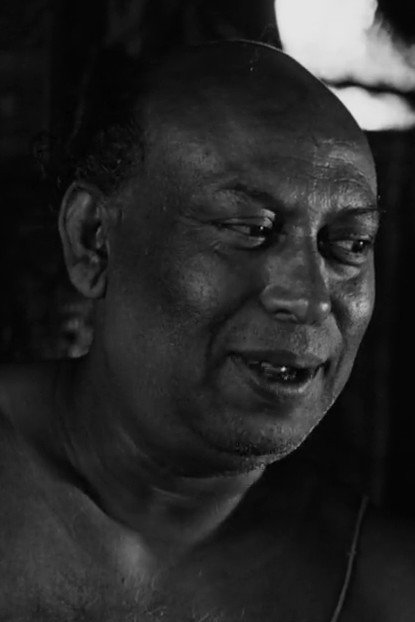 Tulsi Chakraborty as Prasanna in পথের পাঁচালী