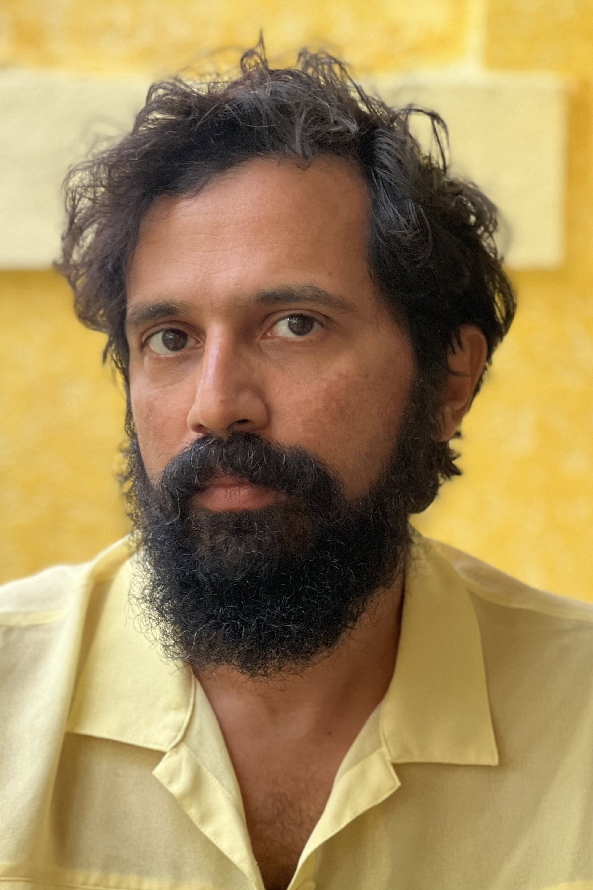 Sarang Sathaye as Ashfaq Auliya in OK Computer