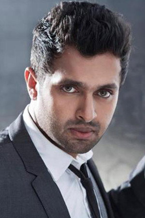 Vineeth Kumar as Nikhil Maheshwar in Devadoothan