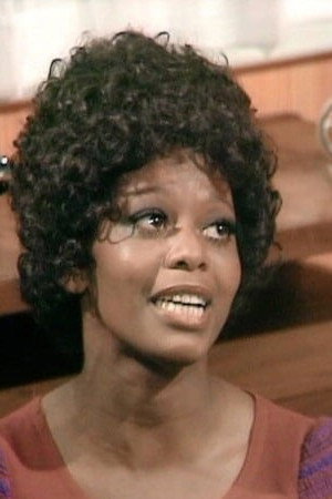 Nina Baden-Semper as Barbie Reynolds in Love Thy Neighbour