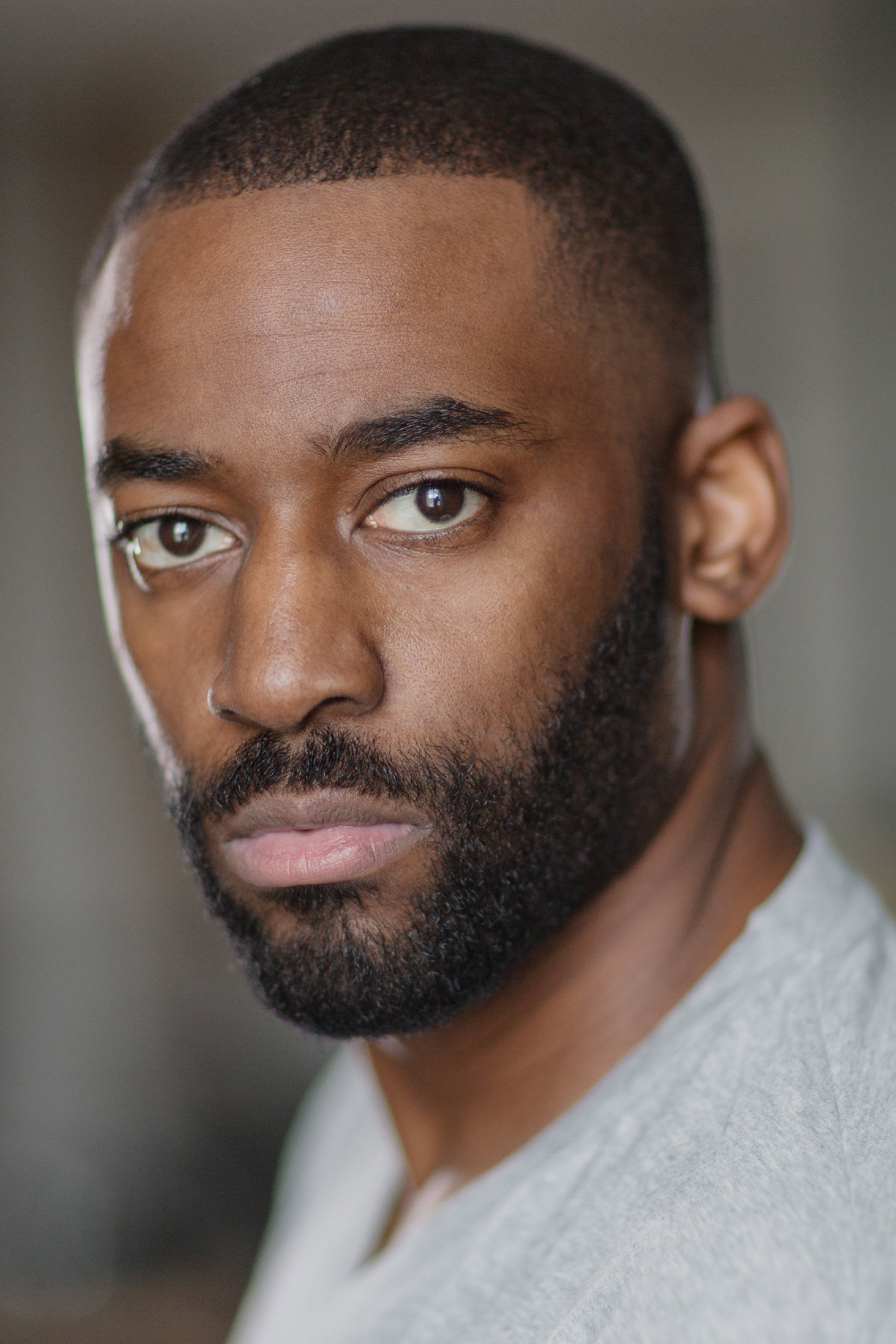 Ashley Thomas as Dom in In Flight