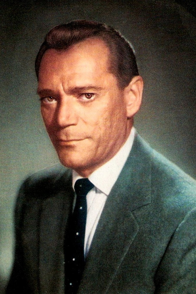 Eddie Constantine as Clown Pablo in Roncalli