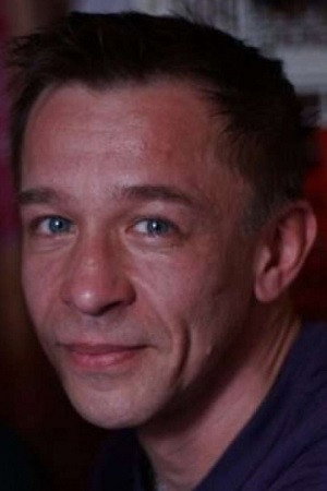 Igor Ugarov as Gena, engineer at the car showroom in Night Shift