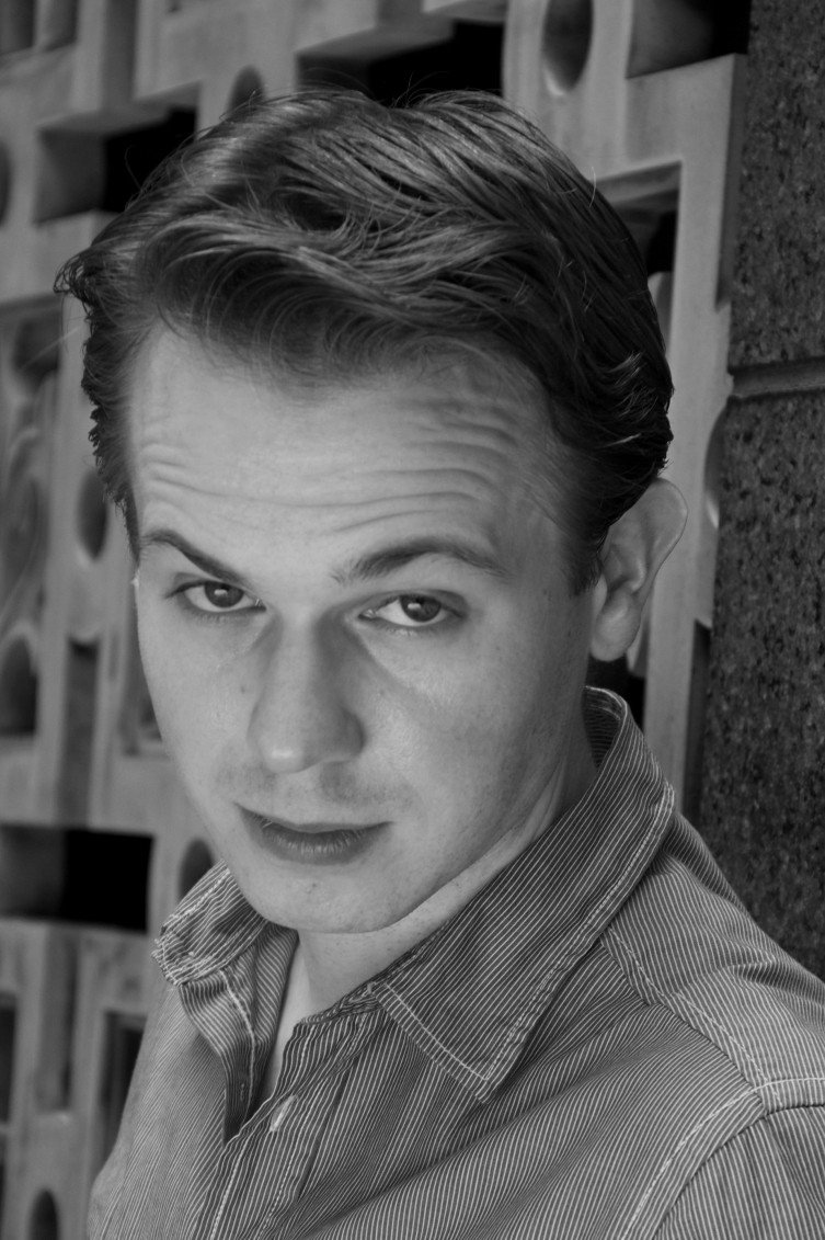 Sam Vanivray as Newscaster in Motorboat