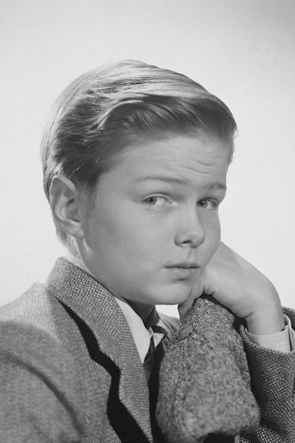 Orley Lindgren as Dan Light (as a boy) in Wild Stallion
