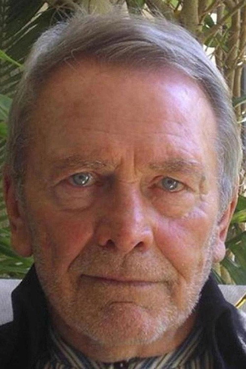 Ralph Cotterill as Dr. Baxter in Shark's Paradise