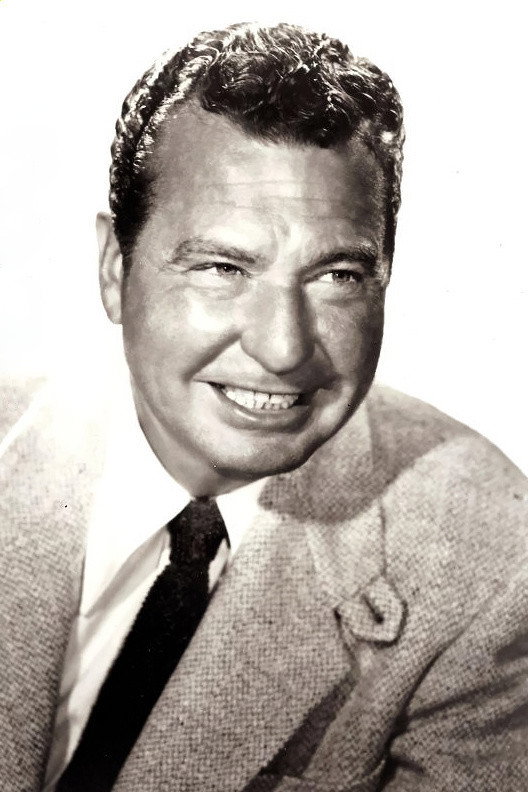 Phil Harris as O'Malley (voice) in The Aristocats