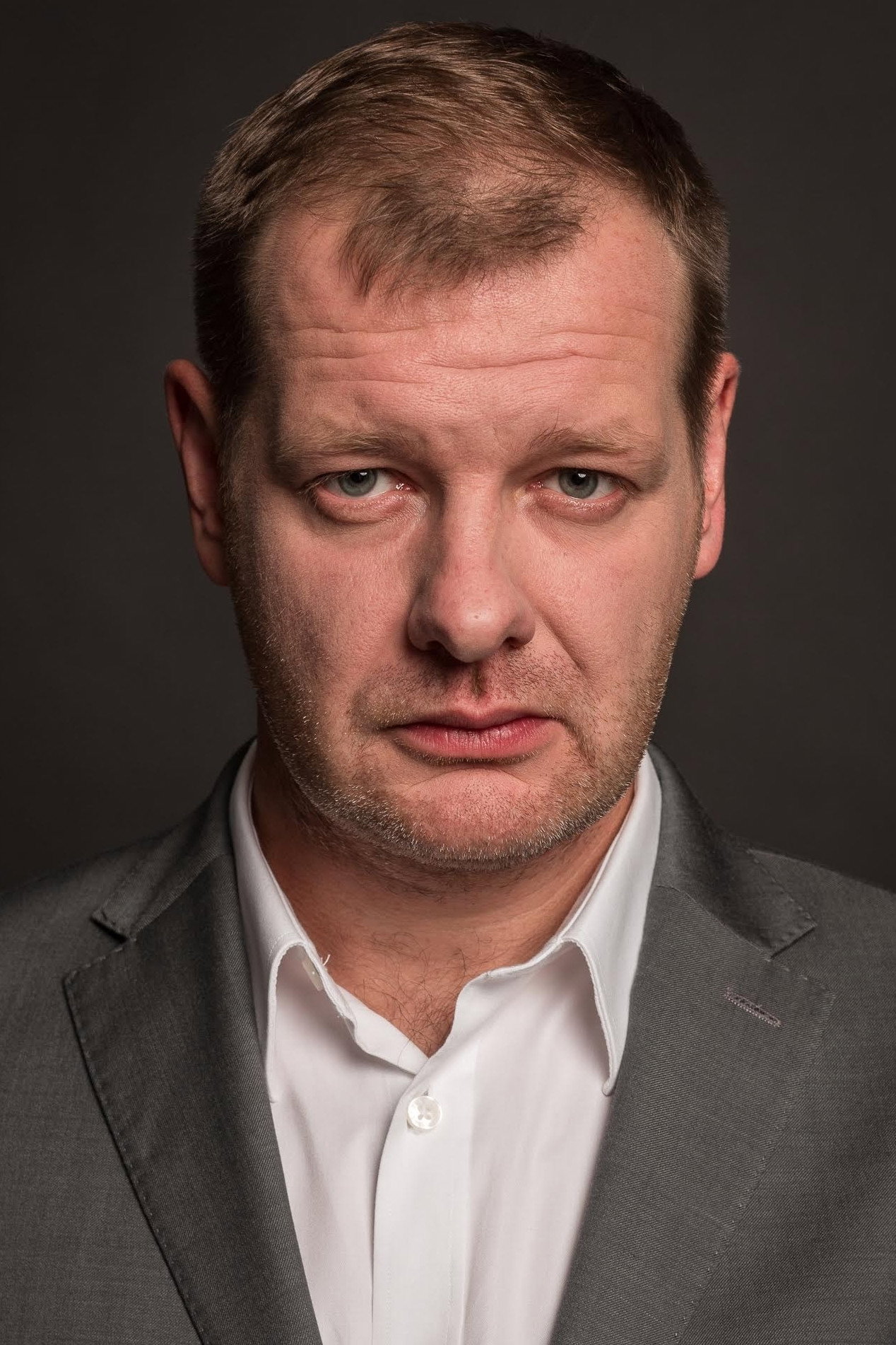 Krzysztof Pluskota as Stanisław Mocek in JJ