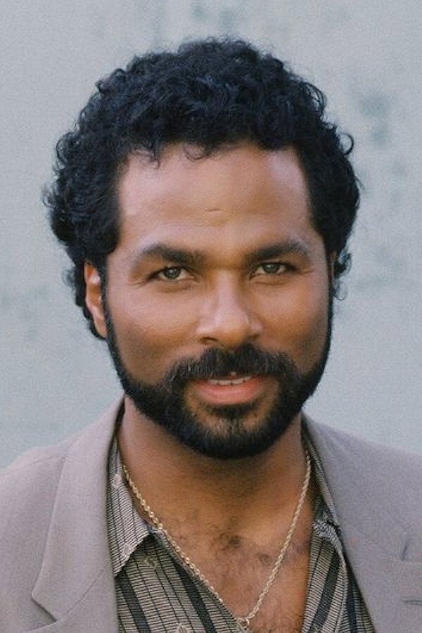 Philip Michael Thomas as Chuck Gilmore in The Tale of the Bookworm