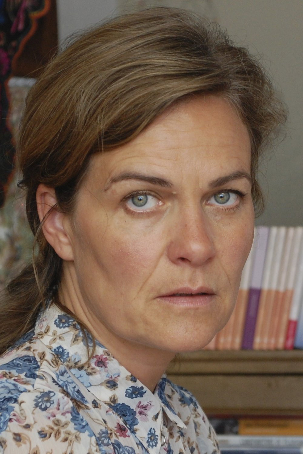 Berte Fischer-Hansen as Charlotte, journalist in Danes Without a Clue