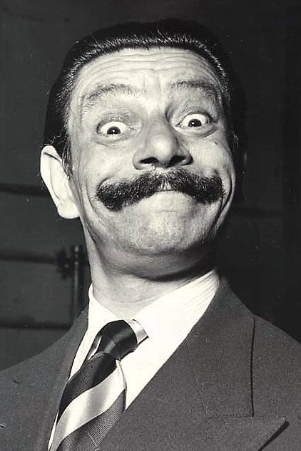 Tino Scotti as Achille Rosso in Il tallone di Achille