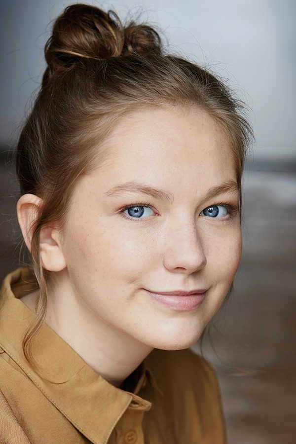 Elsa Houben as Lucie Tessier in My Son's Murderer Will Die Tonight