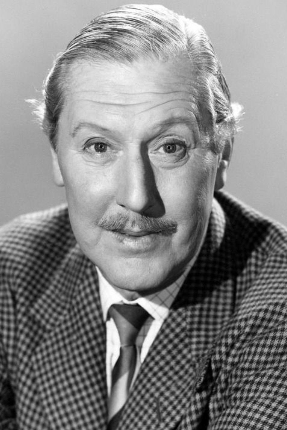 Robert Coote as Rollo Venables in Mr. Moto's Last Warning