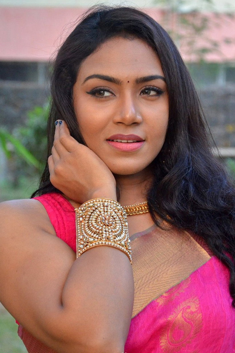 Risha as Meena in Muthu Alias Kaattaan