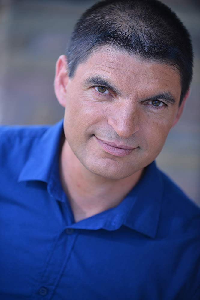 Teo Ciltia as Mr. Natas in Invisible