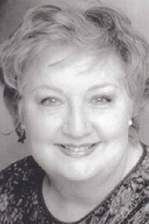 Diane Fabian as Organist in Black Widow