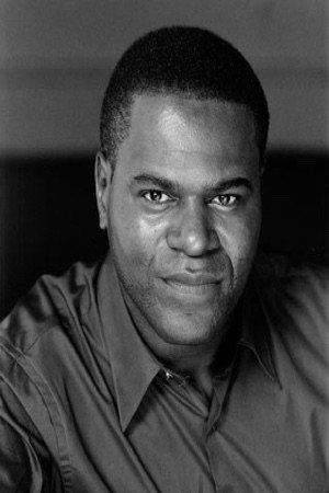 Tony Armatrading as Cop in Alone With Her