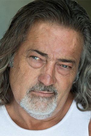 Creek Wilson as Warren in Don't Come Around Here