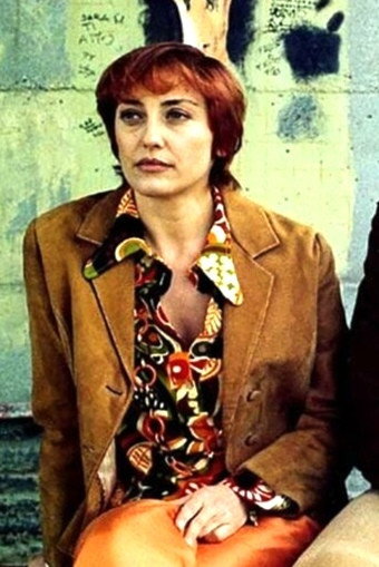 Patrizia Piccinini as Giuliana in Bidoni
